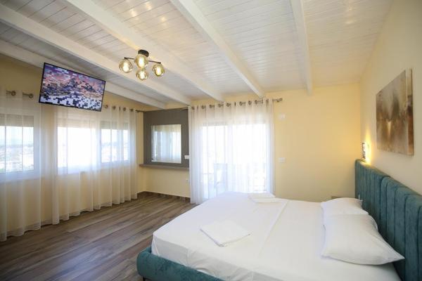 Queen Apartmets Avlonya Oda fotoğraf